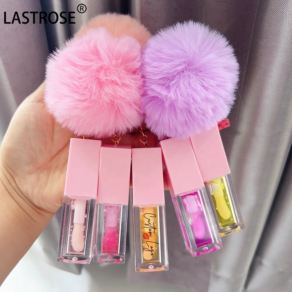 Wholesale Watermelon Lip Plumping Brown Tinted Lip Glow  Coconut Oil Flavouring pink Lip Oil with Pompon Private Label