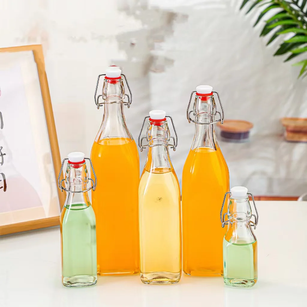 2023 Best Selling 16oz 32oz glass beer bottles Round Swing Top Easy Cap Clear Glass Beer Bottles