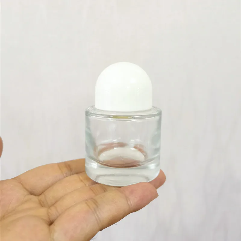 Hot sale 50ml empty custom cylinder shape glass spray pump perfume bottle for sale