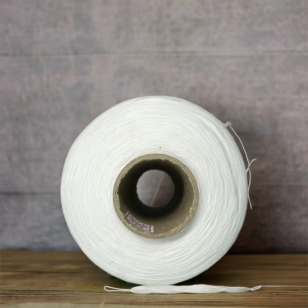302 303 RSP Raw White 100% Recycled Staple Spun Polyester Sewing Yarn