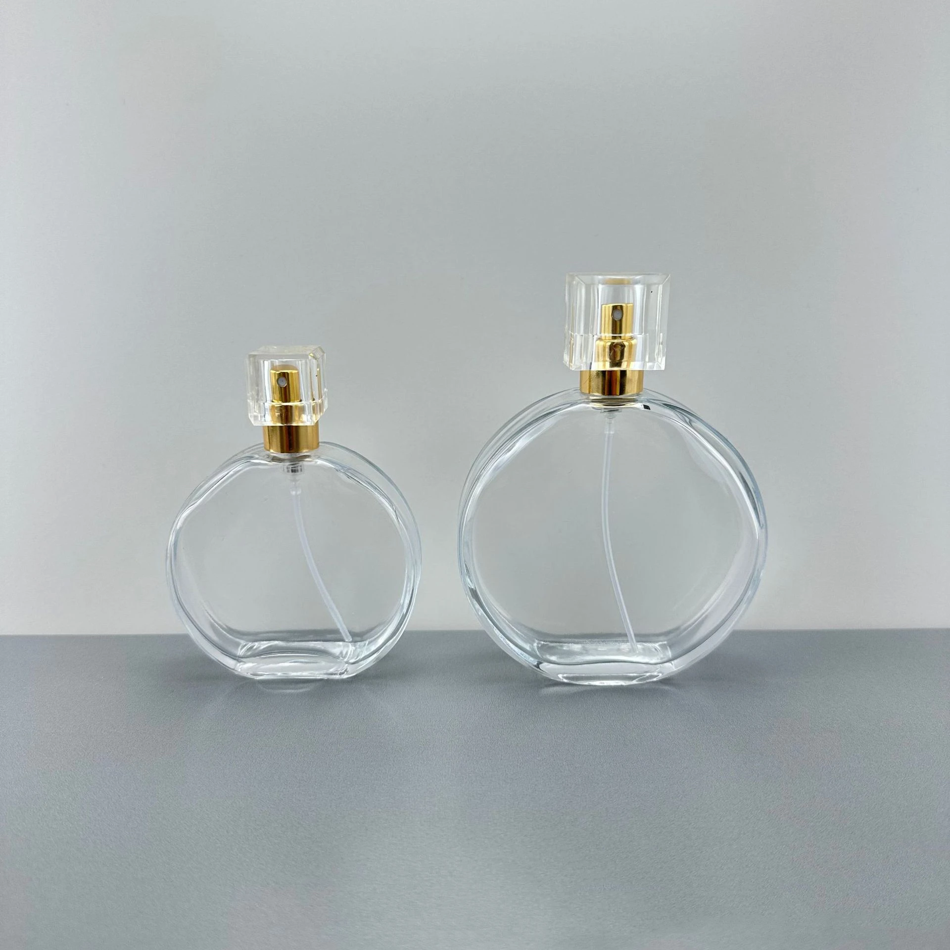 Luxury Empty Flat Round 50ml 100ml Glass Perfume Spray Bottle