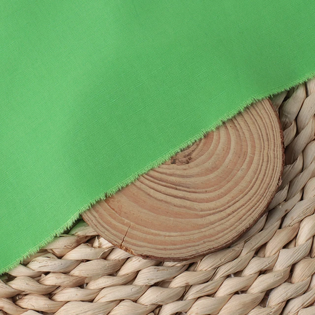 Wholesale smooth 30S plain slub lyocell linen fabric for spring and summer shirts and dresses