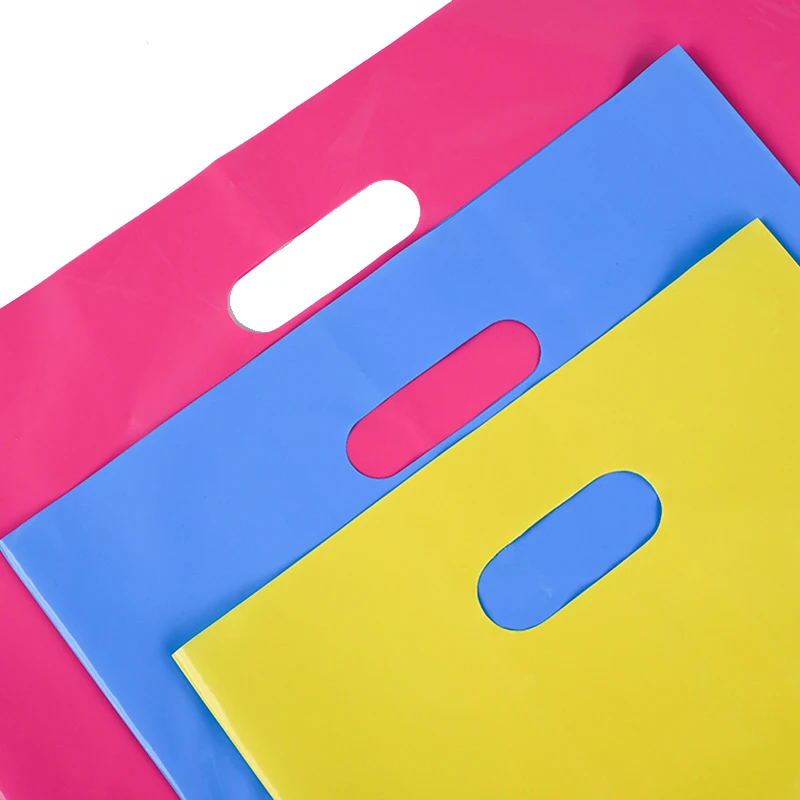 Custom Logo Retail Plastic Bags Die-Cut Handles Poly Shopping Clothing Bag Glossy Colored Plastic Bag For Business