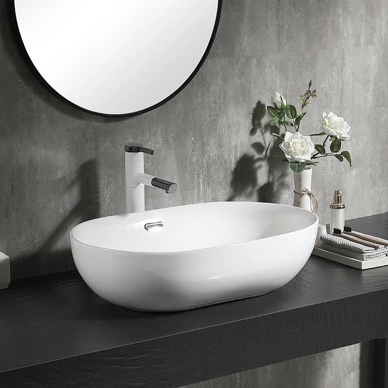 Modern cheap price simple style ceramic oval big size bathroom  counter top basin art basins washing sink for home