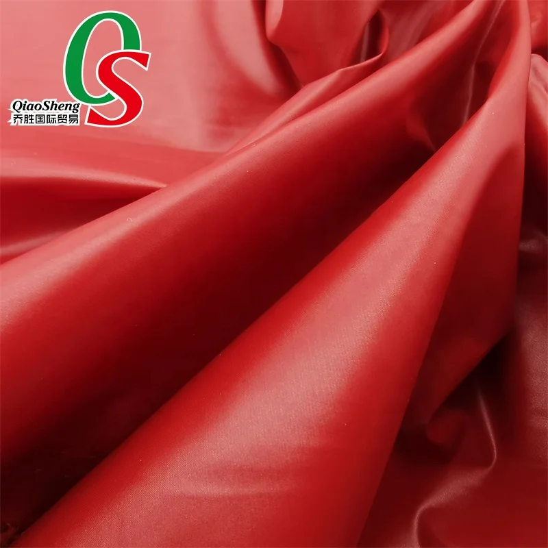 100%nylon downproof windproof water Repellent plain taffeta heavy cire oil calender fabric for down jacket warm cloth