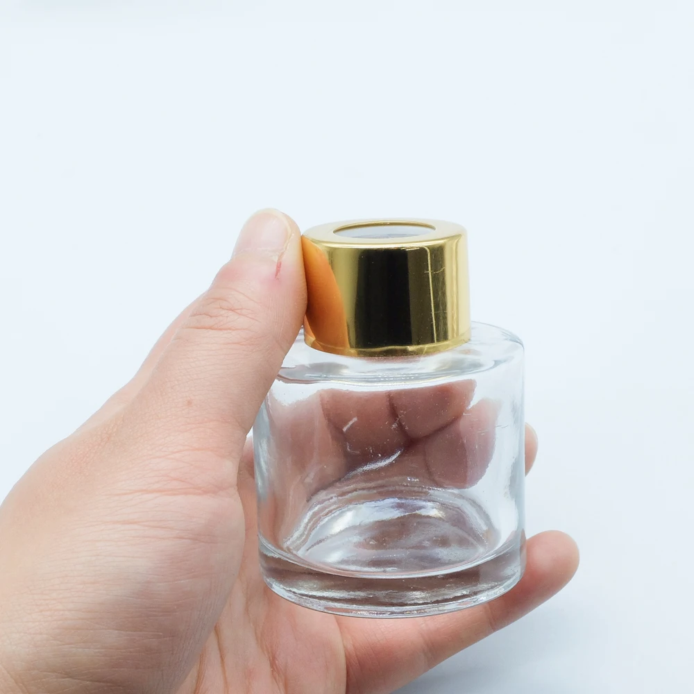 Top Supplier Luxury 50ml Small Clear Essential Oil Cosmetic Perfume Reed Diffusers Bottle with Rose Gold Mat Screw Lid/Cap/Top
