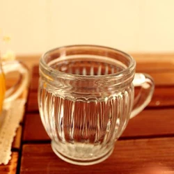 Xuzhou Stocks China Manufacture Wholesale Ribbed Pudding Bottle with Handle 130ml Coffee Tea Drinking Glass Cup