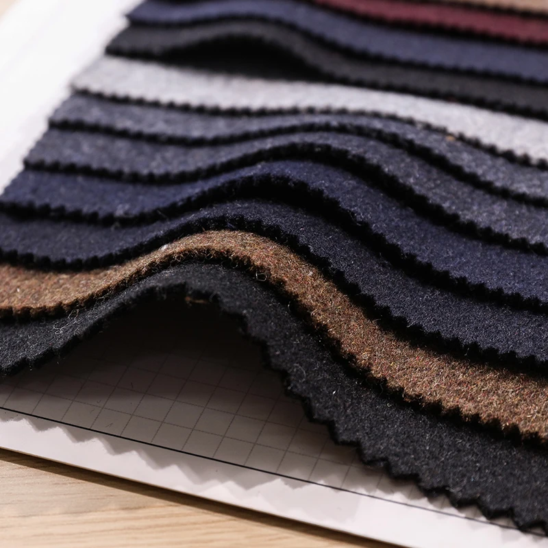 Stock lot heavy wool polyester one side over coating woolen fabric for coat