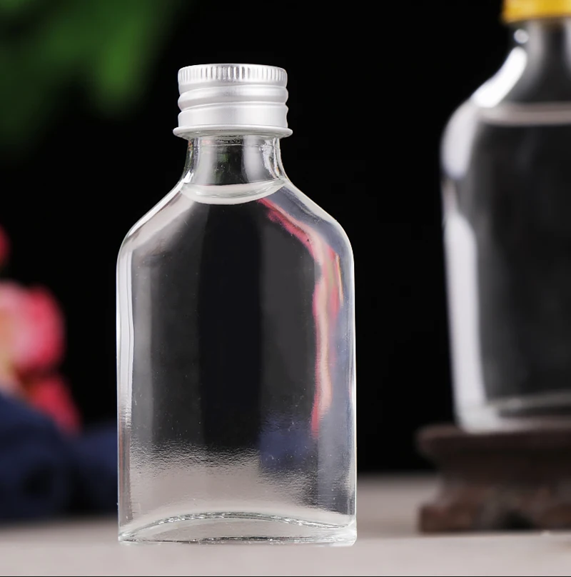 High quality hot selling 100ml gin glass bottle with aluminum sealing cap flat wine bottle