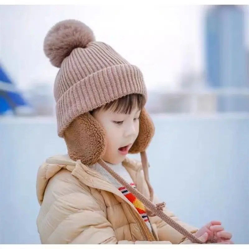 Ruimantike    Wholesale Cute Earflap Hat Beanie Cold Winter Child Kids Baby Knit Hat with Fur Pom Pom Ball