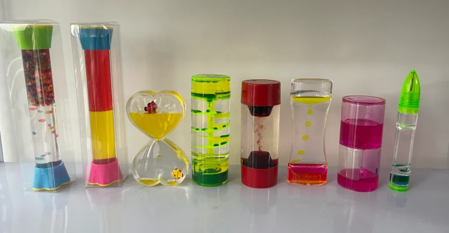 Customized Logo Kids Toys Floating Acrylic Oil Water Drops Drip Toys Purple Liquid Motion Floating Spiral Hourglass Bubble Timer