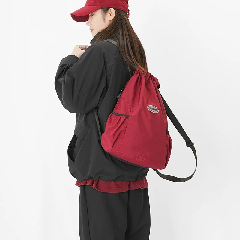 Lightweight casual fashion backpack beam mouth solid color sports backpack