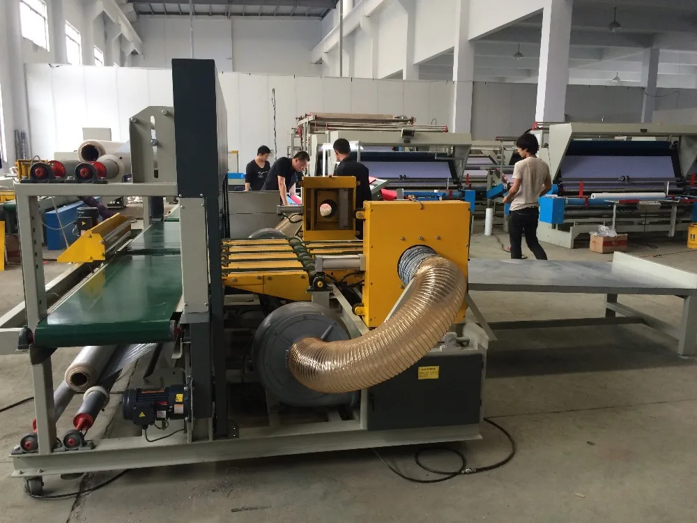 
Automatic Heat Shrink wrapper Machine to Pack Fabric Rolls By P.E. Film 