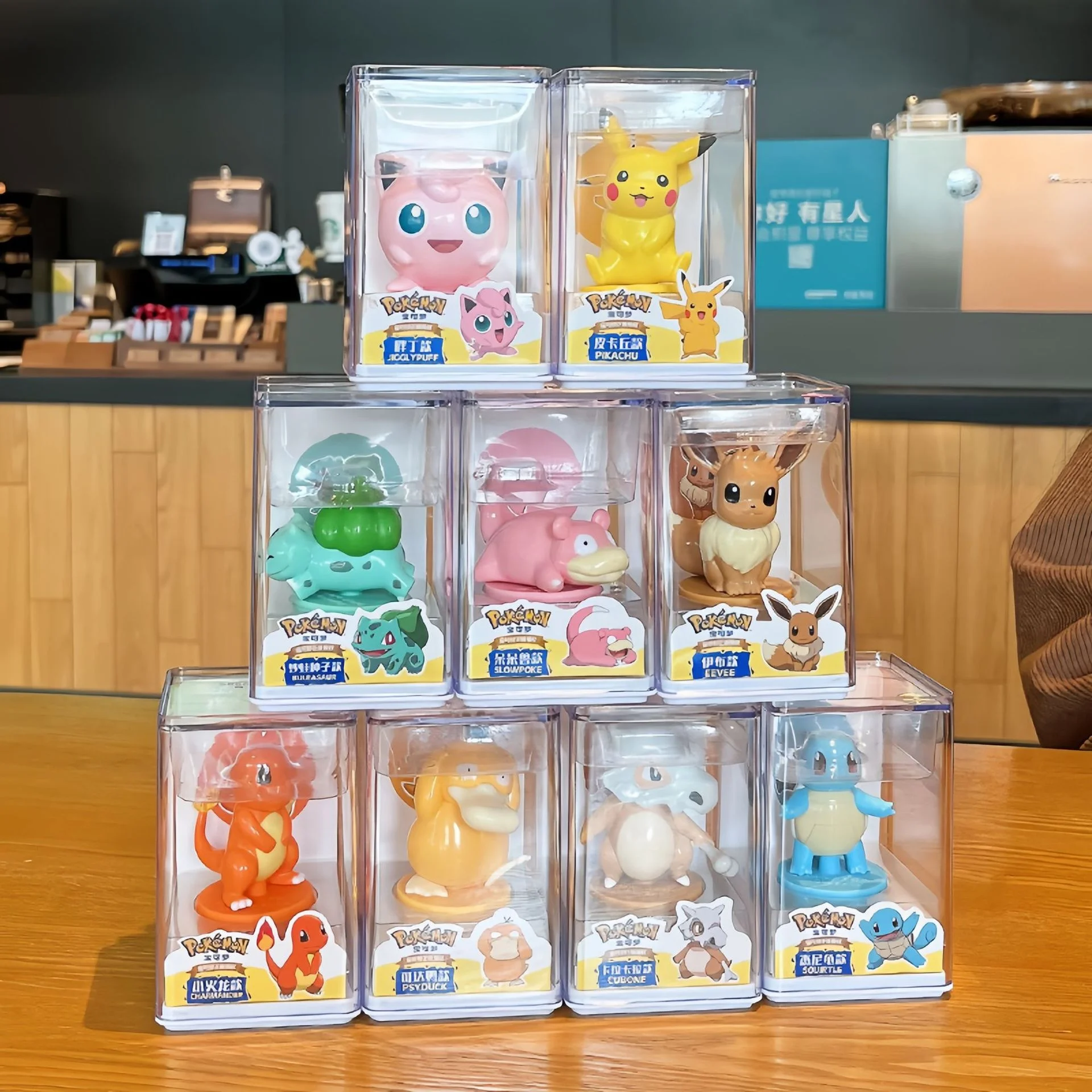 9 Styles Cubone Squirtle Bulbasaur Charmander Pikachu Psyduck Eevee Jigglypuff Pokemoned Seal Scene Boxed Figure Gift Box Toys