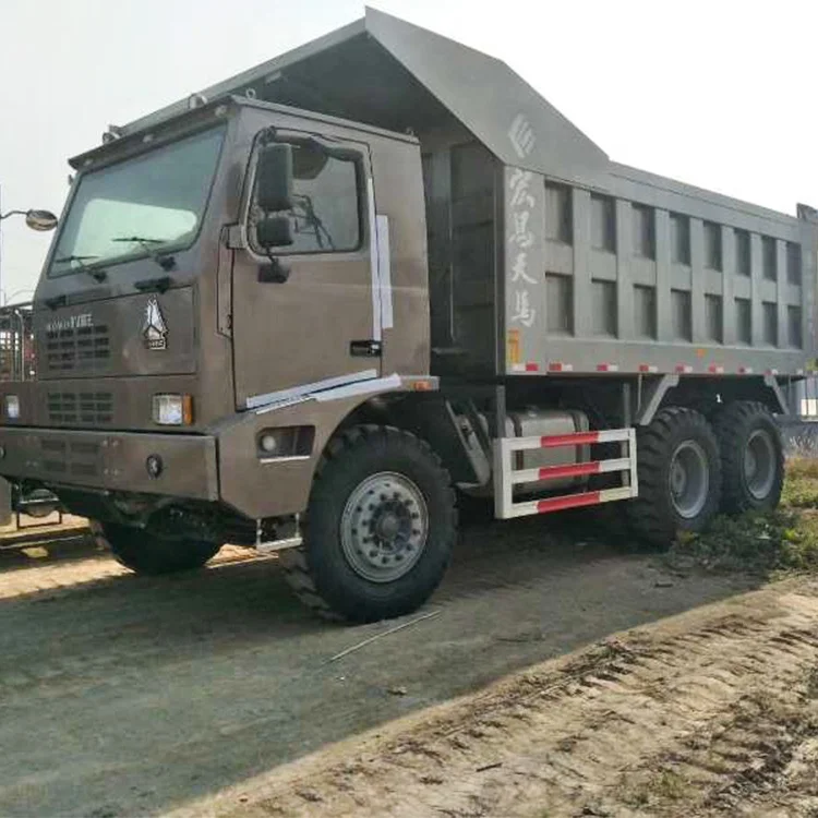 Heavy mine dump trucks sinotruk load 100 tons 6*4 howo mining tipper truck