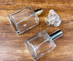 BESTSUN wholesale 30ml 50ml 100ml clear empty fragrance glass with pump spray lid perfume bottle square atomizer for cosmetic