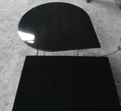 black granite circle hearth fireplace