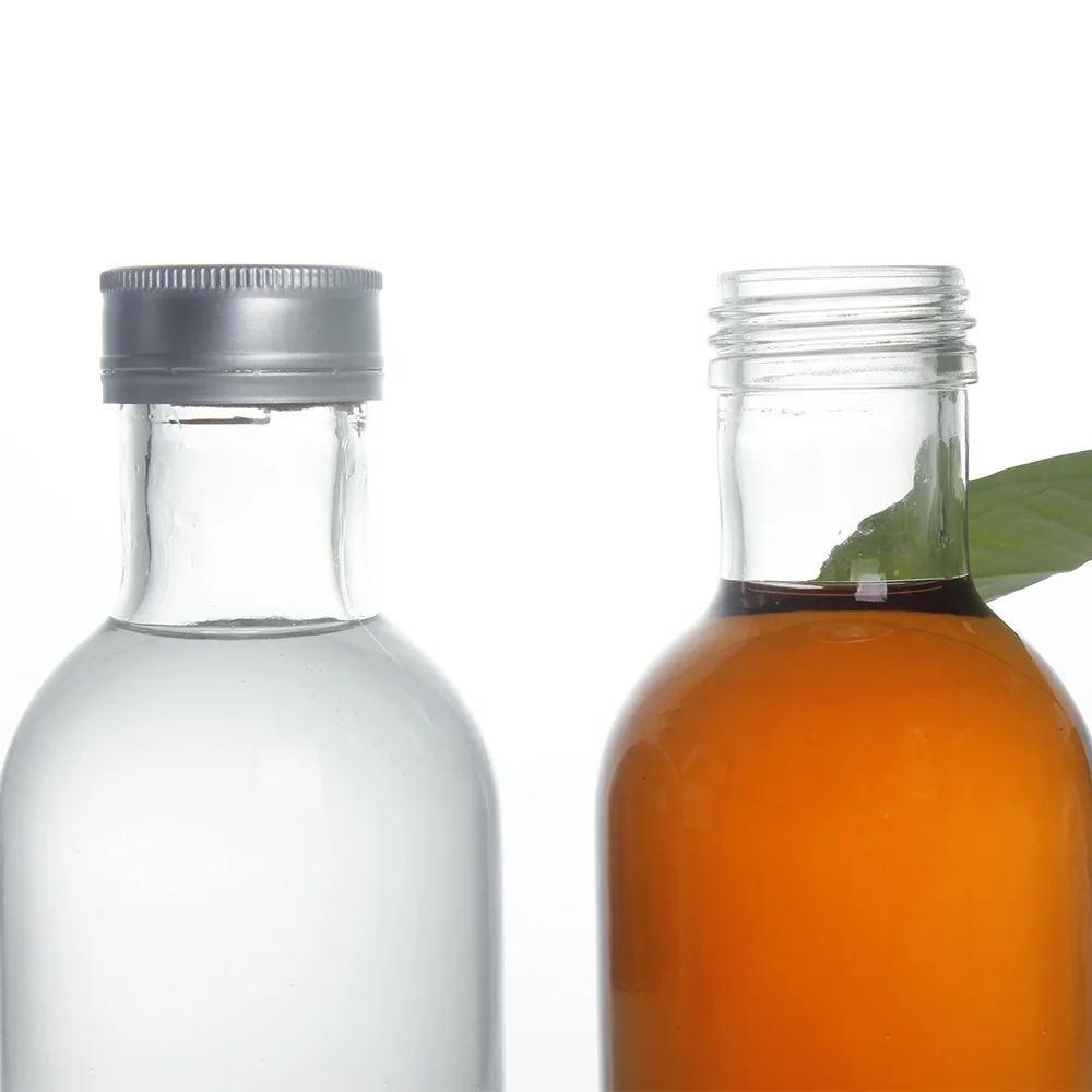 Stocked round clear empty 350ml glass bottle for beverage drinks 120oz fruit juice glass bottle