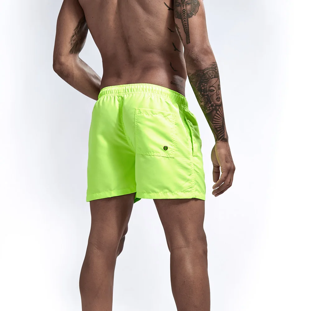 China Factory Cheap Price Custom Logo Mens Swimwear Solid Beach Shorts Pants Men Neon Green Men Swimsuit Wholesale No Logo