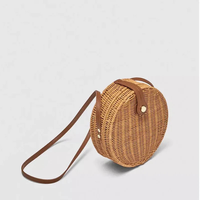 High quality portable lightweight cheap round summer rattan bag indonesia