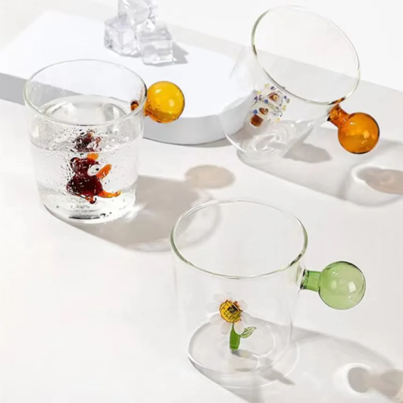 56H Simple three-dimensional cartoon shape, round ball, color handle, glass drink, water cup, single-layer cup