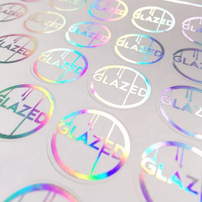  wholesale custom hot stamping silver hologram transparent sticker waterproof clear holographic foil self adhesive