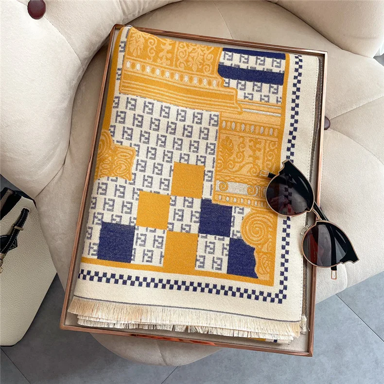 Bufanda de mujer de color de contraste 2021 invierno coreana bufanda gruesa de marca de estudiante de borla de Cachemira