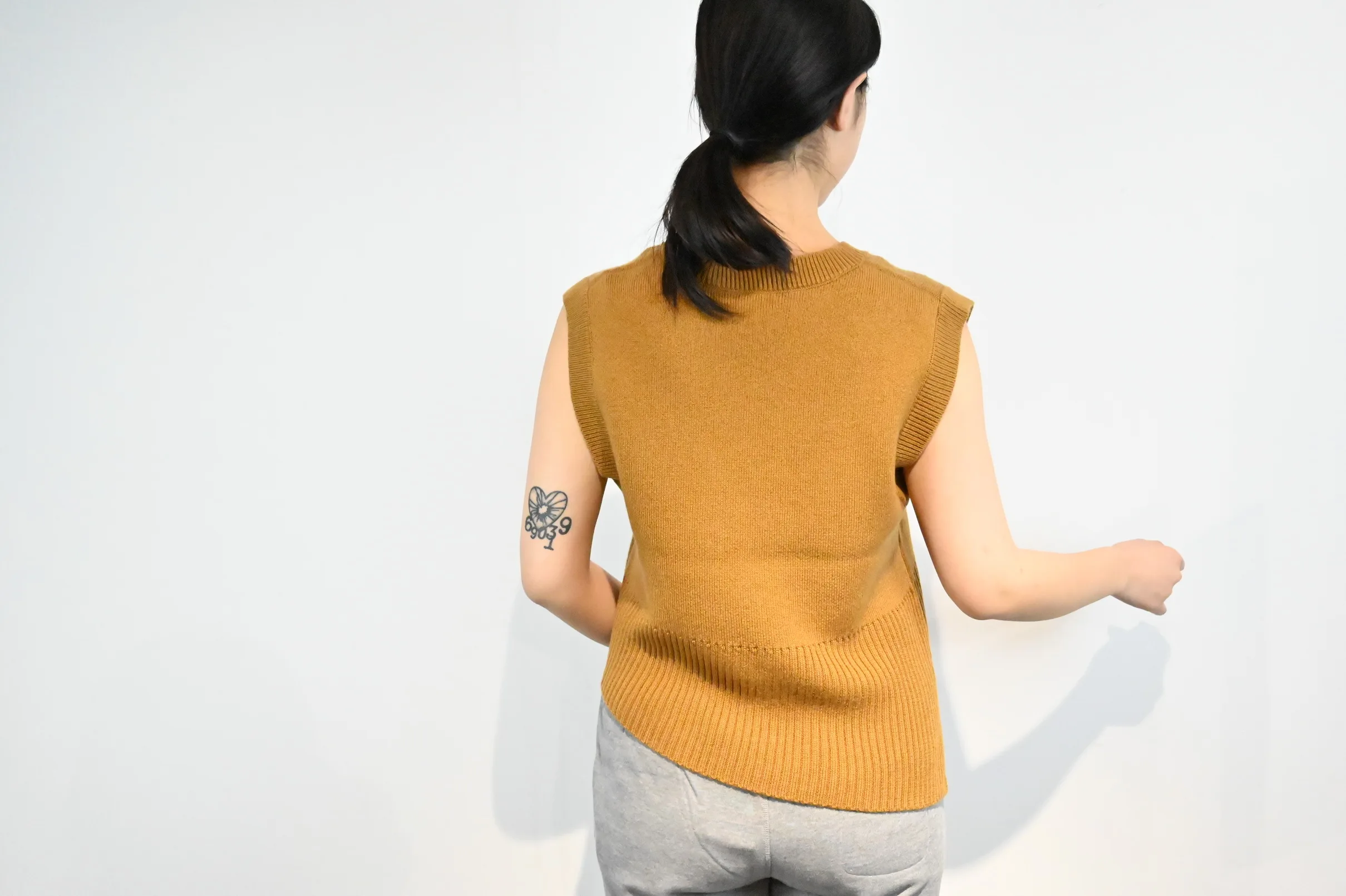 Woolen Custom Winter Knit Vest Sweater Women V Neck Irregular Bottom Designed Sexy Sleeveless Sweater Vest