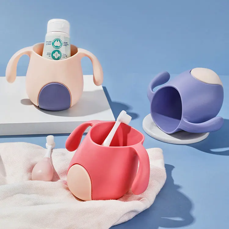 OEM/ODM 14*8cm 180ml New Bevel Angle Spill Proof Double Handle Drinking Learning Brush Teeth Food Grade Silicone Baby Cup