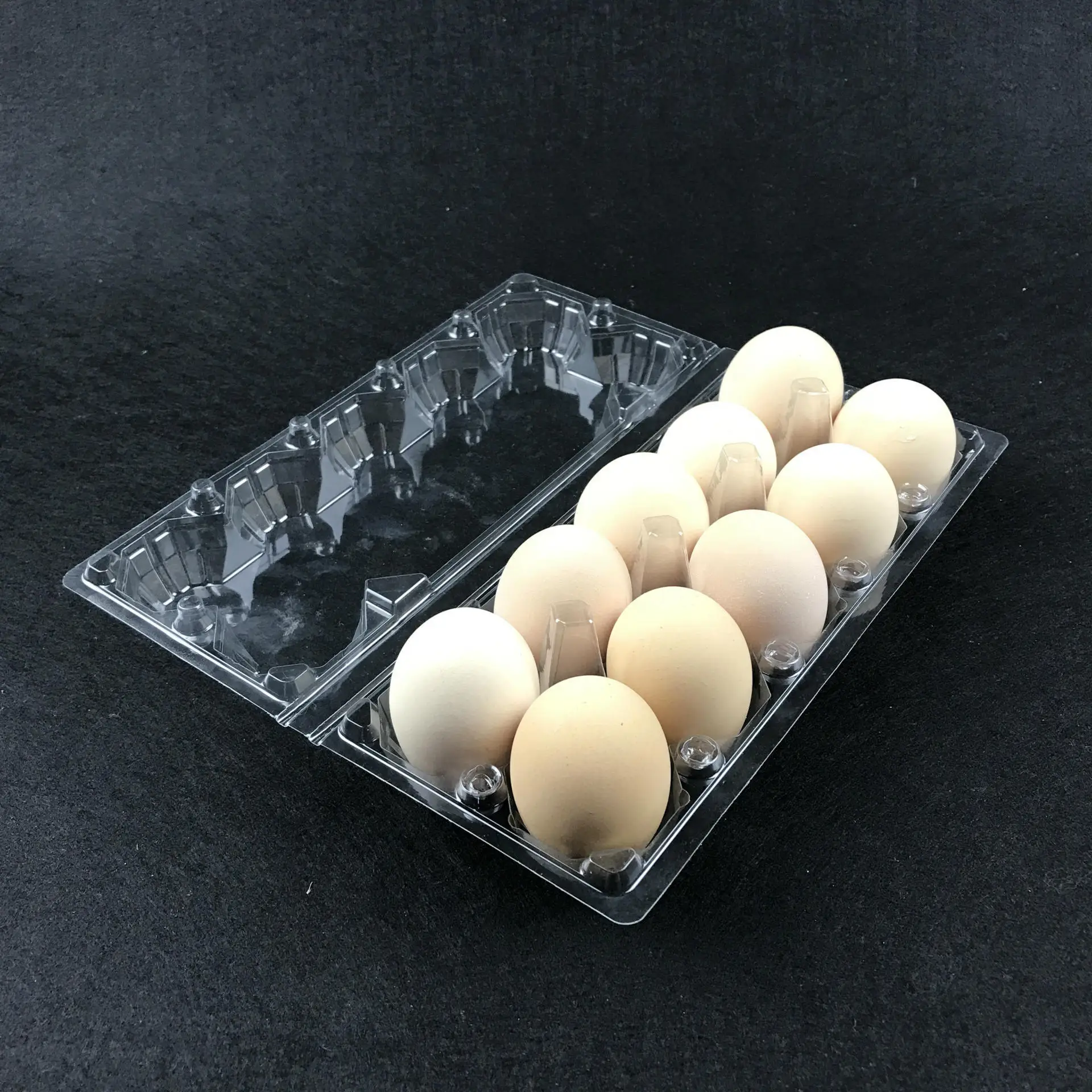 A plastic PET  egg trays egg box used by supermarkets to prevent eggs from breaking