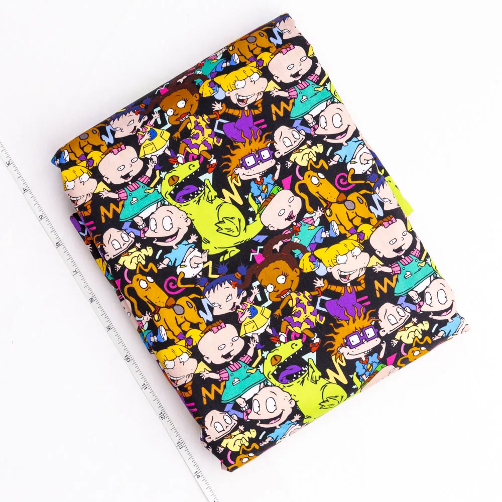 Customized 140gsm light weight 100% cotton woven cartoon printed fabric for dress