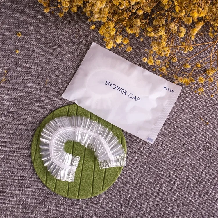 
customized logo hot selling waterproof recycled transparent disposable shower cap for hotel 