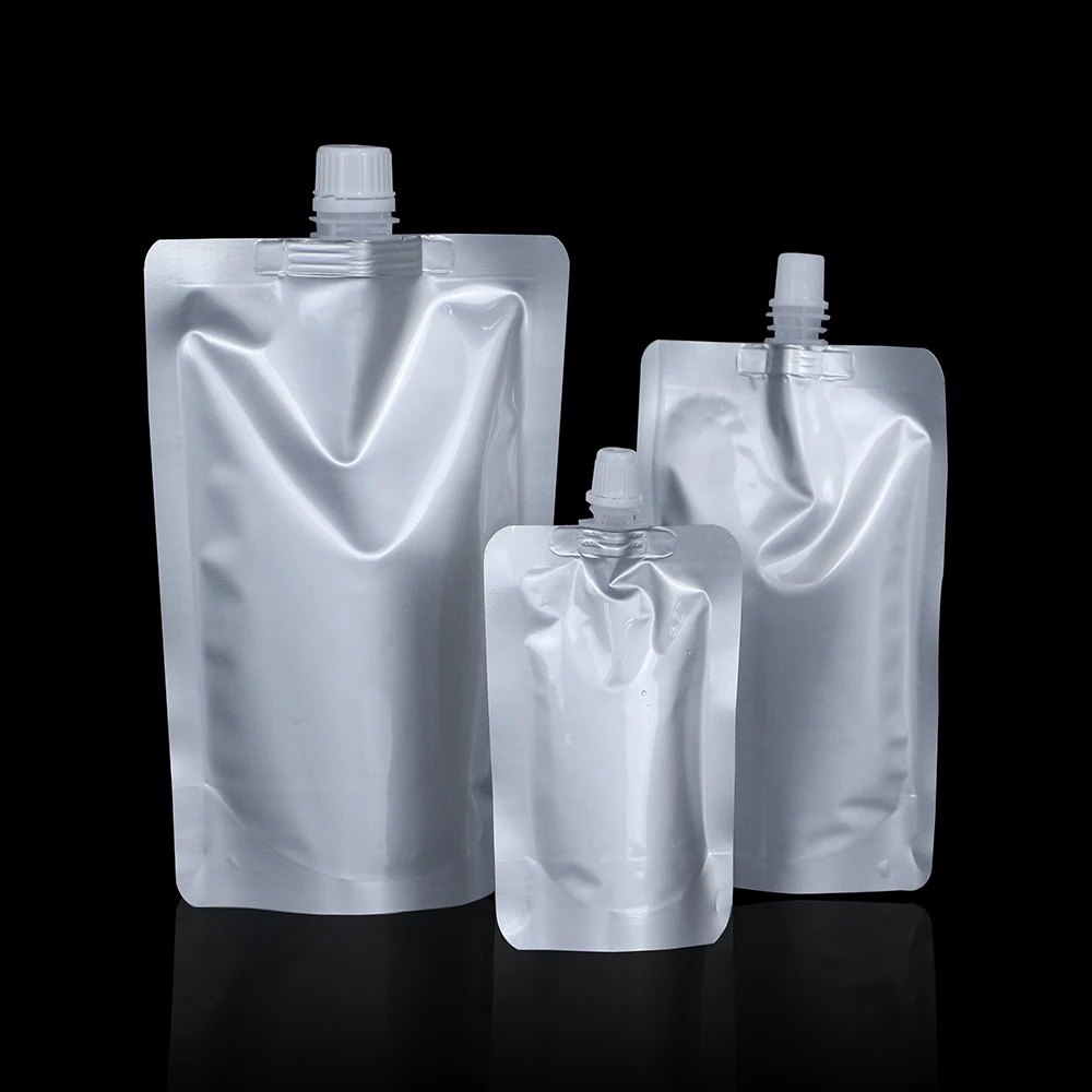 Wholesales stand up pouch plastic aluminum foil nozzle packaging bags with spout for water juice wine tea coffee packaging