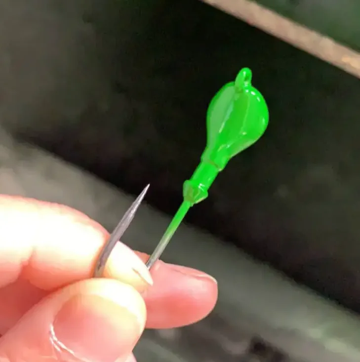 Wholesale fishing lures banana jigs head mustad hooks for sale