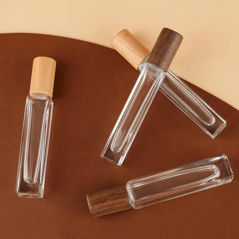 Clear glass essential oil roller bottles 10ml 15ml roller bottles for essential oils with wood cap