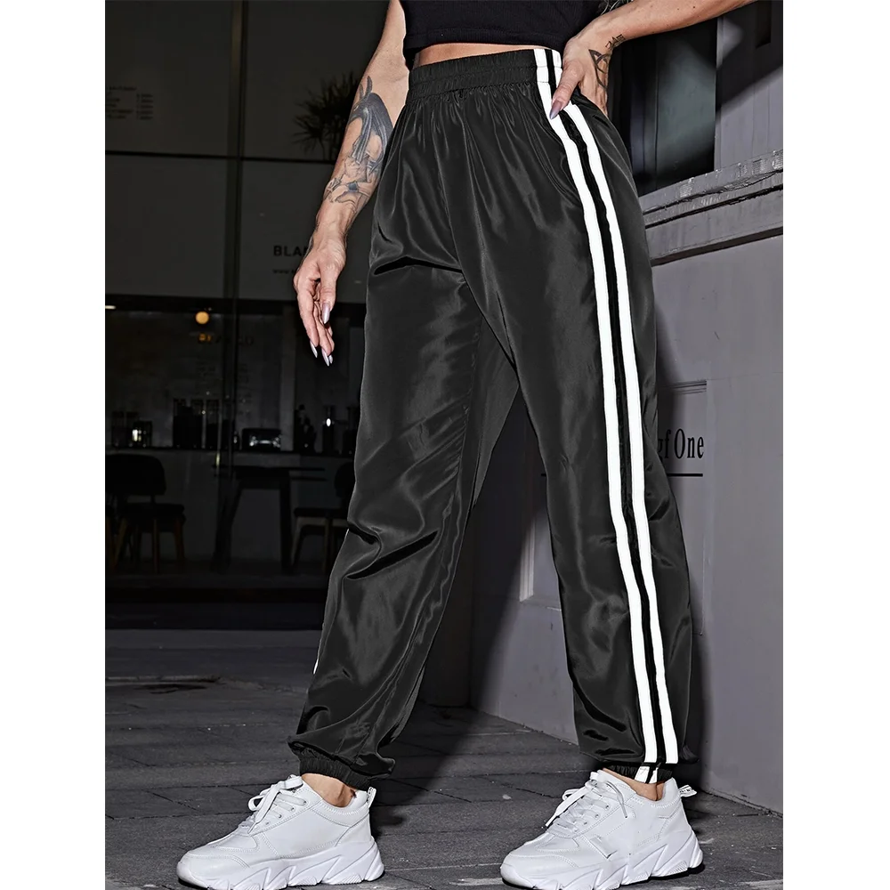 Custom baggy sport satin polyester ladies trousers reflective stripes joggers harem sweat pants women