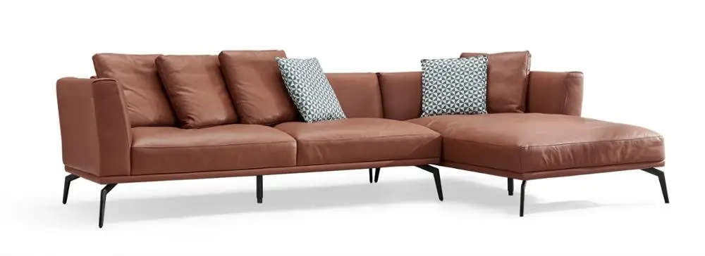 
Cigar - colored leather corner sofa in reception room 