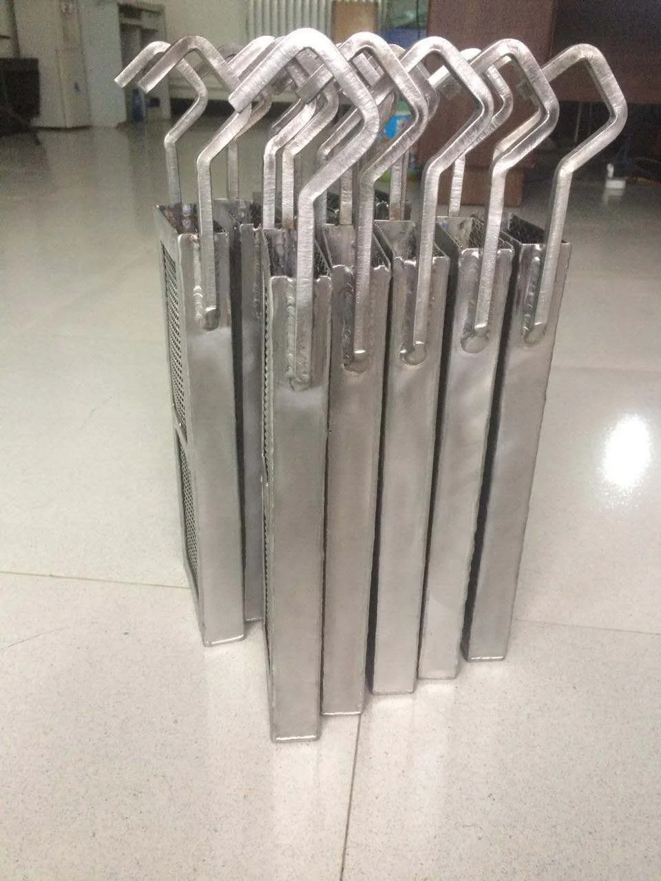 Titanium baskets for  platinized titanium electrode titanium anode
