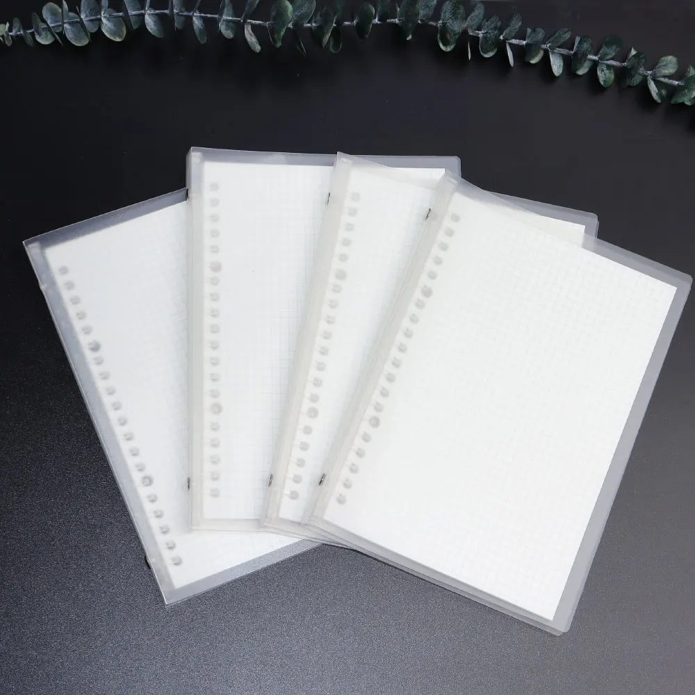 Wholesale PP cover school a5 spiral grid notebook with 4 pieces
