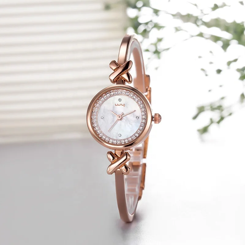 Raymons WY-022 most buyer cheap price 3ATM waterproof ladies slim stainless steel strap bracelet wrist watch women with diamond