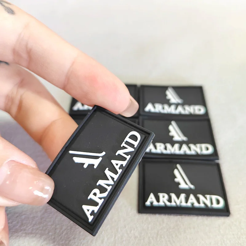 Manufacture Custom 3d Raised Brand Name Logo Soft Pvc Rubber Patches Silicone Badge for Garment