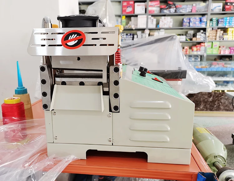 
Automatic Multi functional zipper webbing elastic ribbon masking mask ear loop tape hot and cold Cutting tape machine 