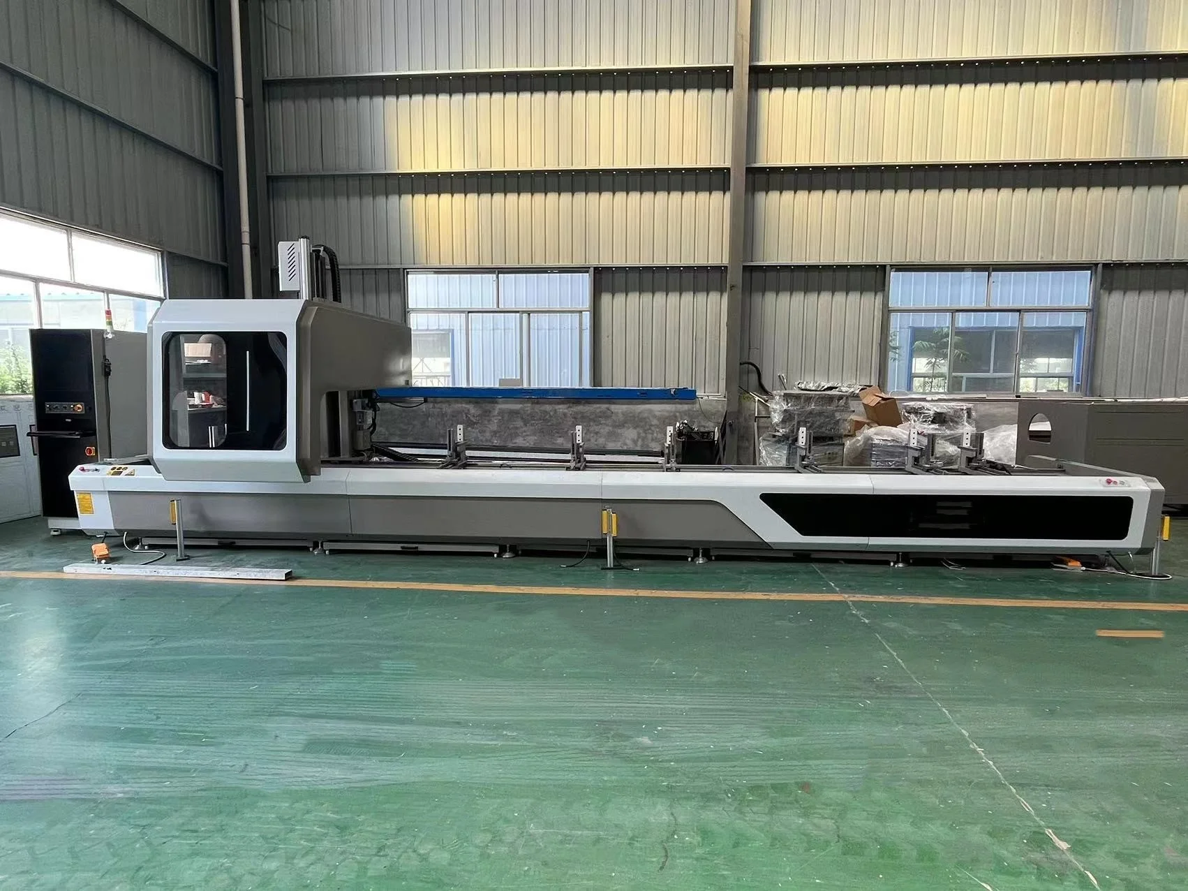 High-speed four-axis CNC machining center for aluminum profile Door and window intelligent sawing and milling center