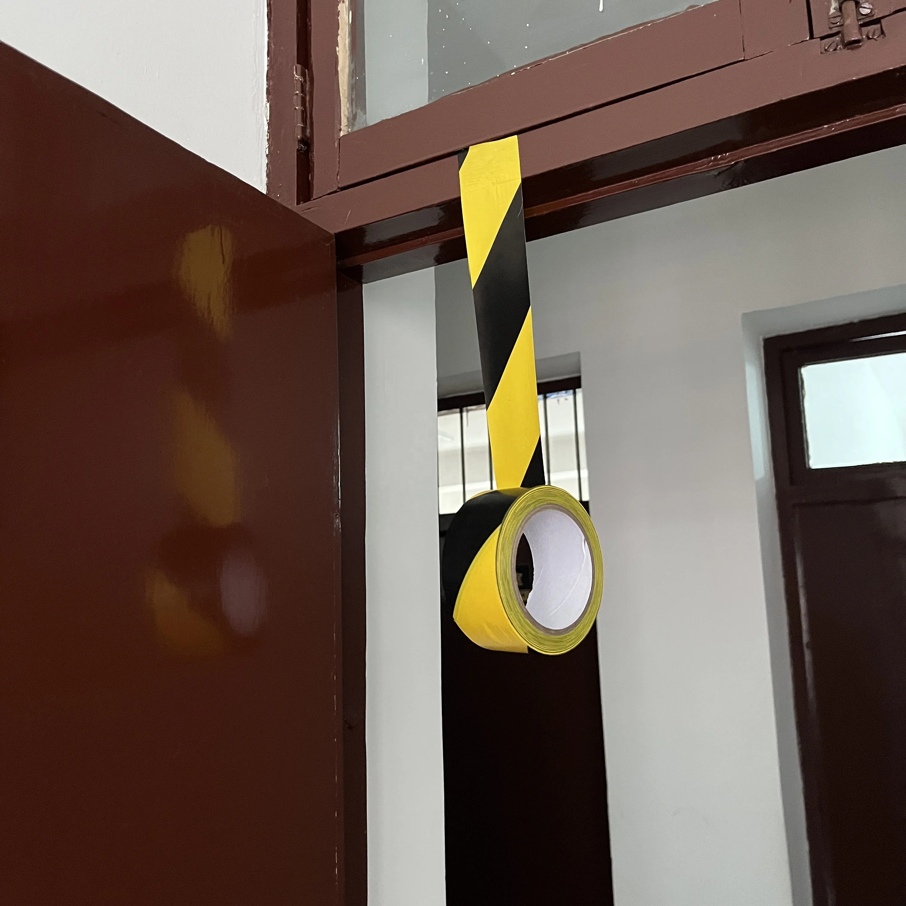 China Factory Hazard Black Yellow Self Adhesive Road Floor Marking Warning Barrier Caution Tape