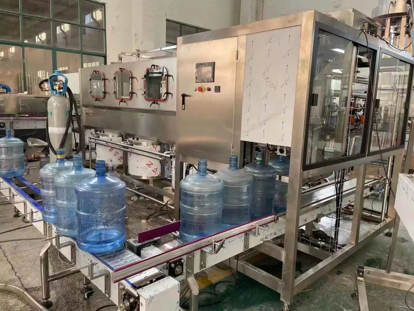 Zhangjiagang factory 5 gallon barreled water filling machine/bootled 5 gallon water bottling line