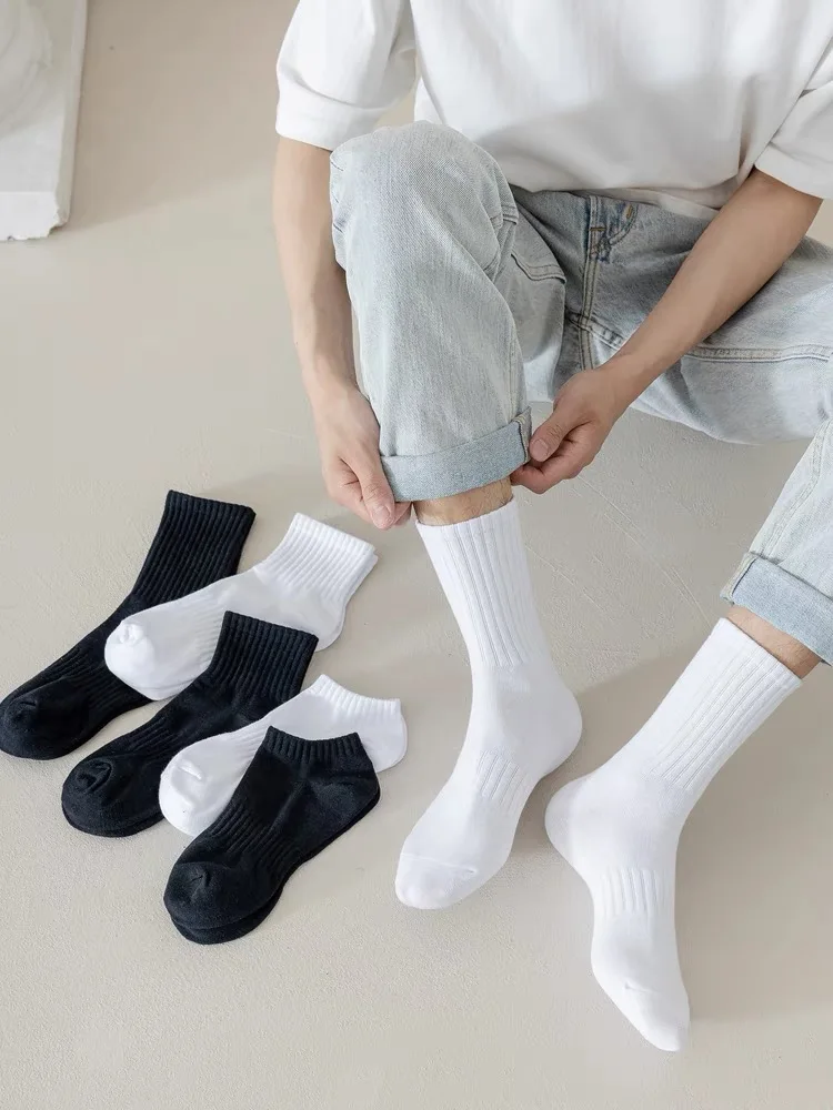 Unisex Compression Crew Length Cotton Socks Black and White Breathable Knit for Spring with Logo on Bottom Cuff for Running