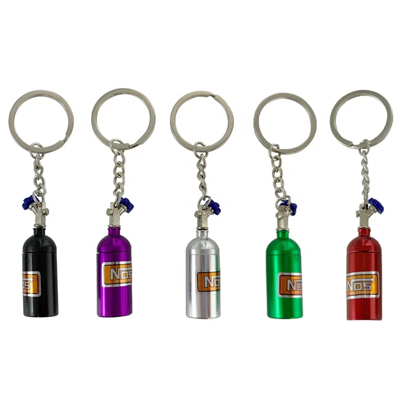 Creative Mini Nitrous Oxide Bottle Keyring Key Chain Pill Storage box NOS bottle Turbocharger Keychain for interior accessories