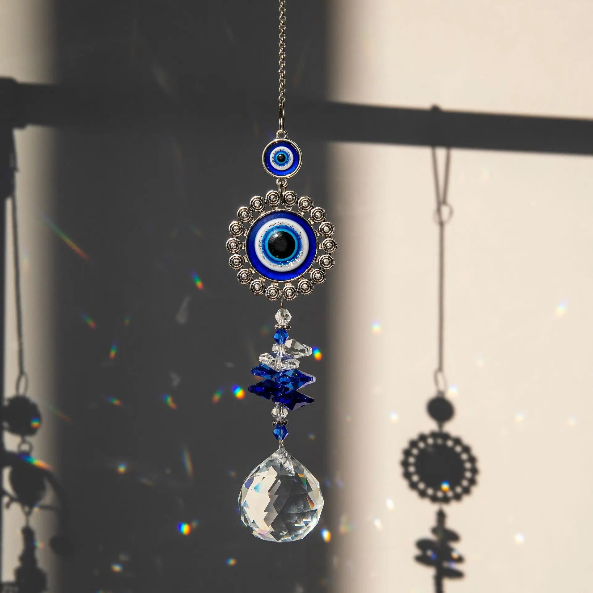 QIAO OEM/ODM Wholesale Crystal Evil Eye Light And Shadow Wind Chime  Hanging Window Gardening  Decor Sun Catcher