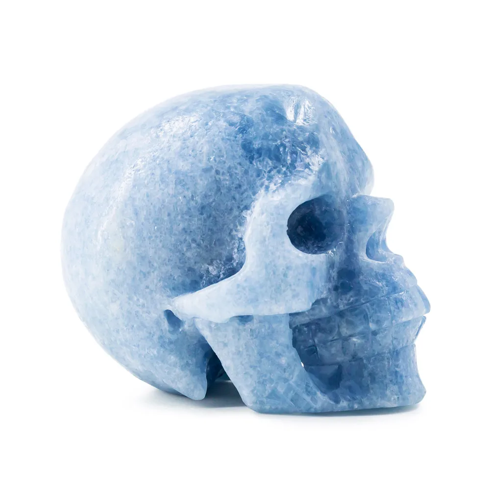 Wholesale natural high quality healing hand craved blue calcite crystal skulls crafts for home decoration