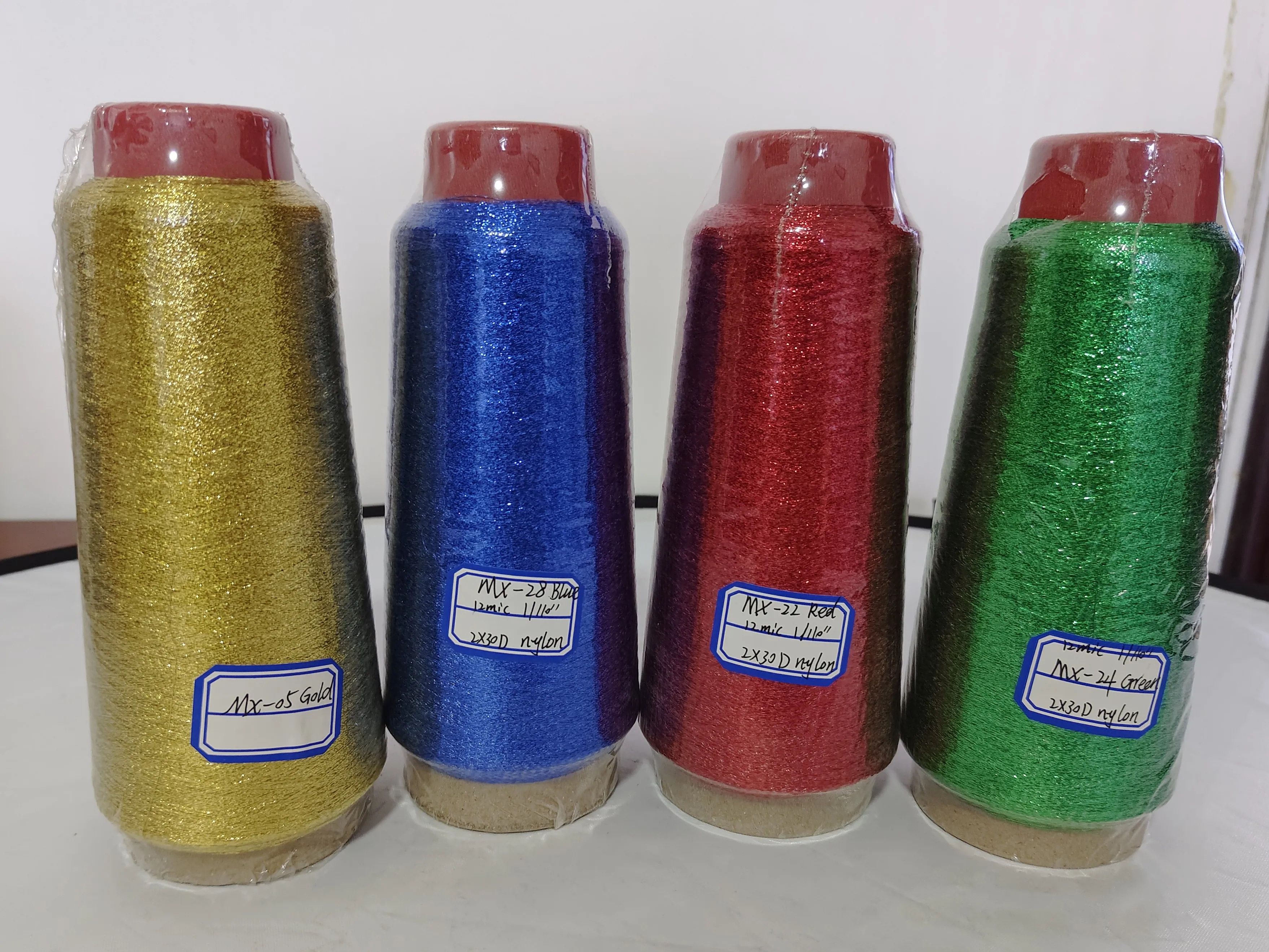 High-Quality MX-Type Metallic Yarn Manufacturer  Multi color Metal yarn Thread for Weaving 12mic 2*30D polyester